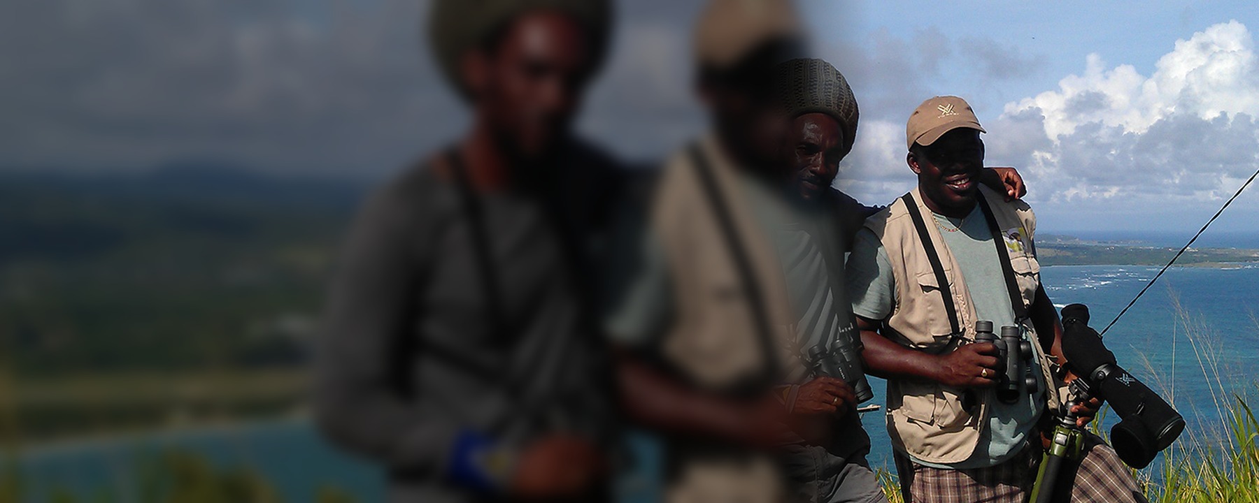 Adams Toussaint with birding equipment at a Saint Lucia coastal viewpoint